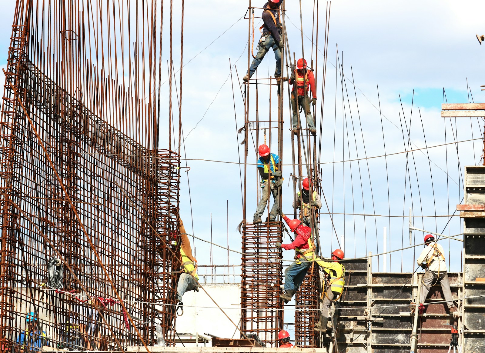 Our Services 2 people working on building during daytime